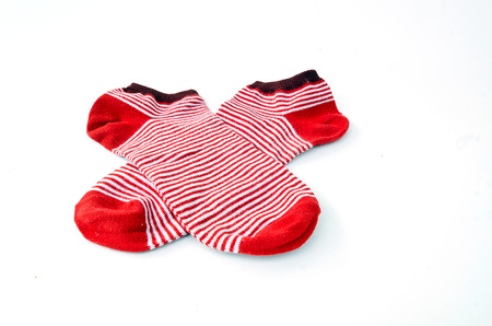 red striped socks isolated on whiteの写真素材