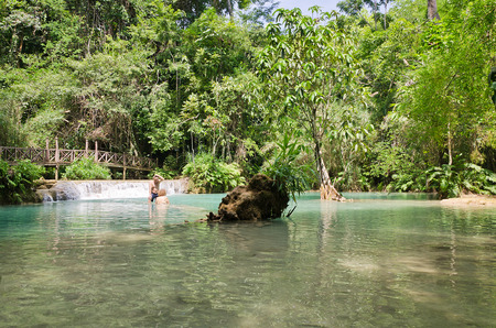 LUANG PRABANG, LAOS - MAY 13: The Kuang Si Falls on May 13, 2014, in Luang Prabang, Laos. These waterfalls are a favorite side trip for tourists in Luang Prabang.のeditorial素材
