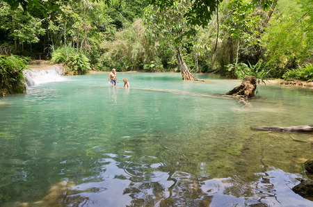 LUANG PRABANG, LAOS - MAY 13: The Kuang Si Falls on May 13, 2014, in Luang Prabang, Laos. These waterfalls are a favorite side trip for tourists in Luang Prabang.のeditorial素材