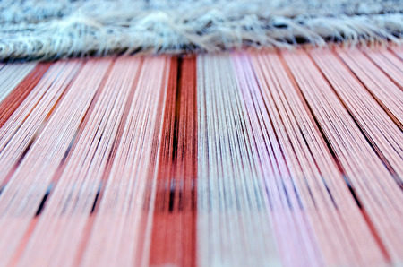 part of loom white thread homemade.の写真素材