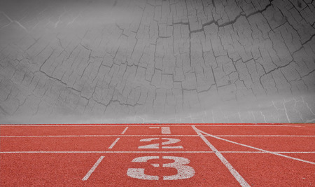 running track number standard red color under wood and dark  sky background