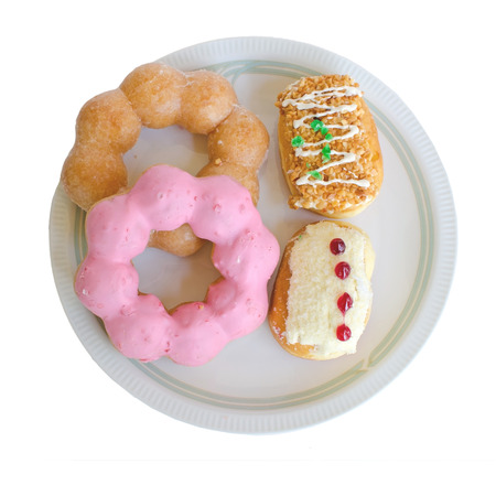 donut on white plate isolated on white