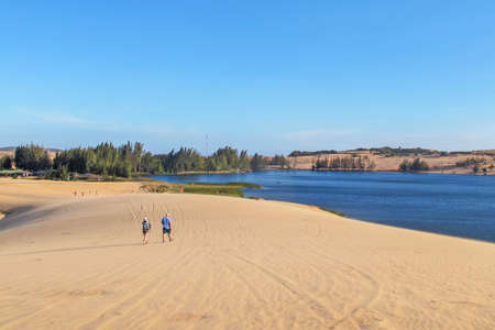 white sand dune desert and lake in Mui Ne, Vietnam.の写真素材