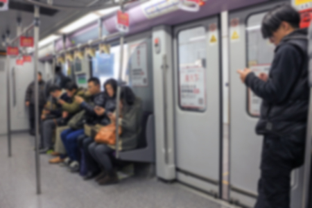 blurred people in subway station.の写真素材