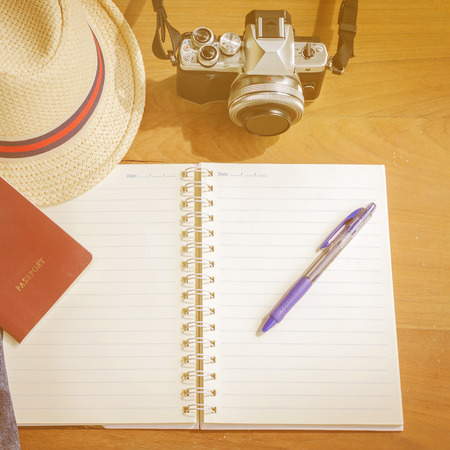 Casual clothing and accessories on the wooden background.の写真素材