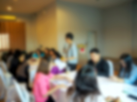 people group in office meeting room blurred in background.の写真素材