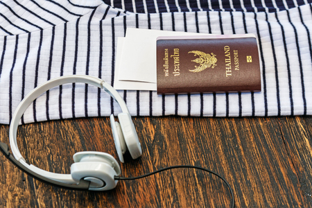 travel accessories, woman costumes, passport and ticket prepare for trip, summer vacation background.の写真素材