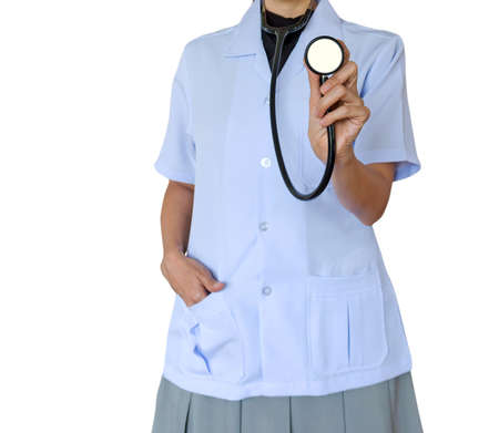 Doctor woman wearing white medical uniform and holding stethoscopes  isolated on white background.の写真素材