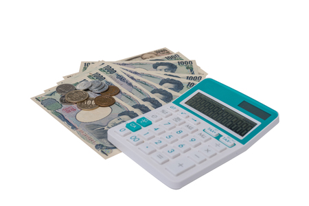 japanese currency yen bank notes with  Japanese yen coin and calculator on white background.の写真素材