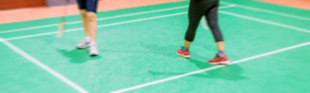 Blurred woman players badminton.の写真素材
