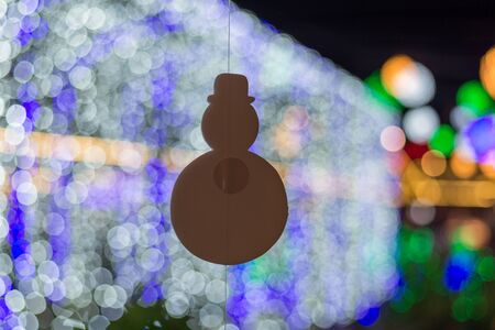 blurred christmas background with light bokehの写真素材