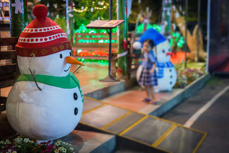 Snowman and Christmas bokehの写真素材