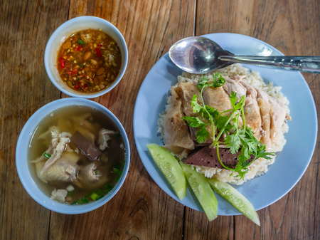 Hainanese chicken rice , Thai gourmet steamed chicken with rice, bean sauce and soup.の写真素材