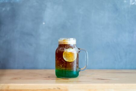 Americano mixed juice, ice coffee with lemon mint and soda.