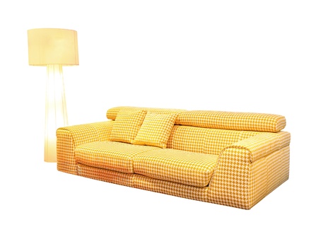 Retro yellow sofa isolated with clipping path includedの写真素材