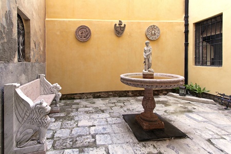Elegant stone garden detail with statue fountaineの写真素材