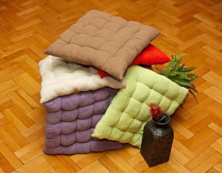 Big pile of colorful kitchen chair pillowsの写真素材