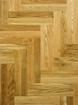 Detailed texture of beige wooden parquet floorの写真素材