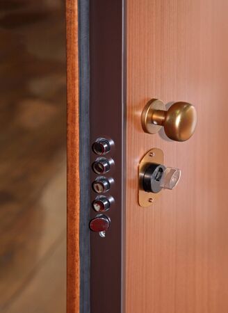 Key in lock of classic home entry door の写真素材