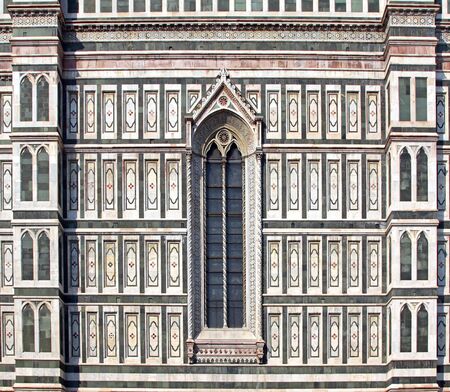 Facade of old Victorian building with tall windowの写真素材