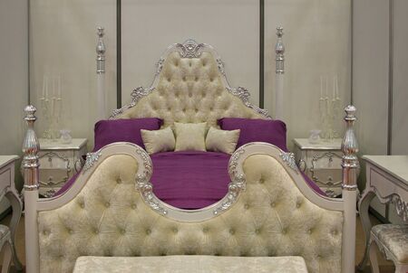 Vintage bedroom interior with stylish large bedの写真素材