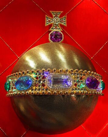 Gold shiny Christmas ornament with colorful dioamondsの写真素材