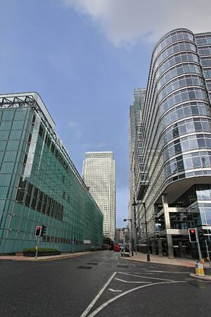 Usually busy urban city street without any traffic and modern architecture buildings on each sideの写真素材