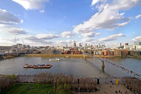 Aerial view of Millenium bridge in London across Thames riverの写真素材