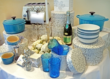 Beautifuly arranged table with champagne bottle and white rosesの写真素材