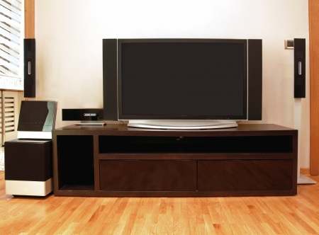Home entertainment unit with plasma TV and surround speakersの写真素材