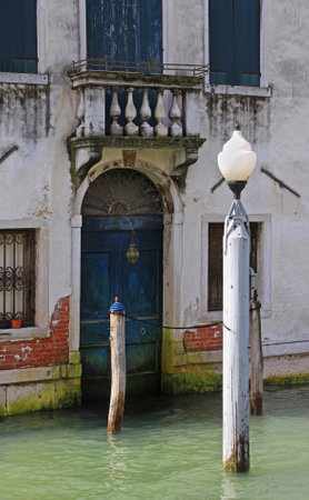 Traditional house entrance from canal side in Veniceのeditorial素材