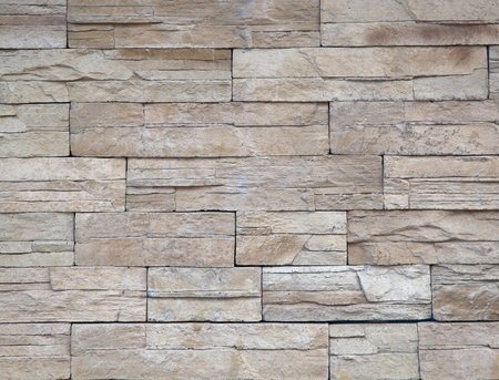 Detailed beige natural stone building material textureの写真素材