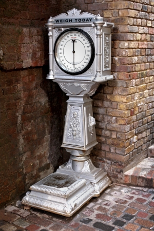 Retro weighing scale used on street in old times for weighing peopleの写真素材