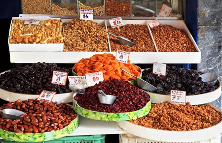Organic dry fruits sold on market stallの写真素材