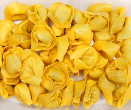 Freshly baked traditional stuffed italian pasta tortelliniの写真素材