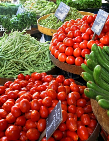 Organic fresh vegetables sold on market stallの写真素材
