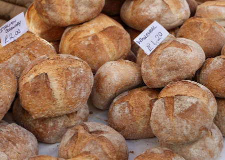 Big pile of freshly baked wholemeal breadの写真素材