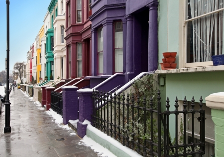 London street with colorful houses during winter dayの写真素材