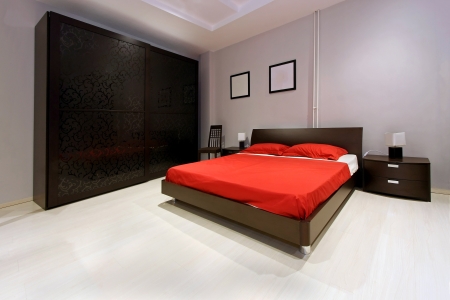 Modern bedroom interior with large closet and bedの写真素材