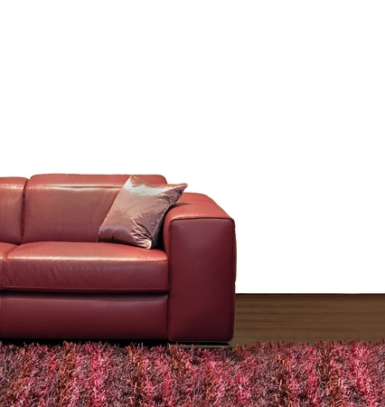 Dark leather sofa with silk pillow in cornerの写真素材
