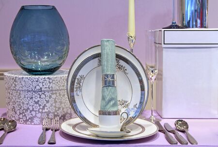 Fancy table plate setting with silver cutleryの写真素材