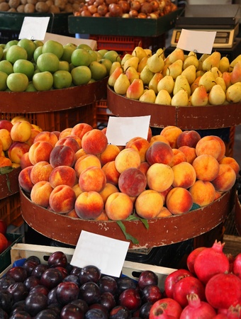 Fresh organic fruits sold on market stallの写真素材