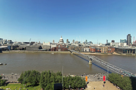 London, United Kingdom - May 30, 2009  London cityscape with Thames river and Millennium bridgeのeditorial素材