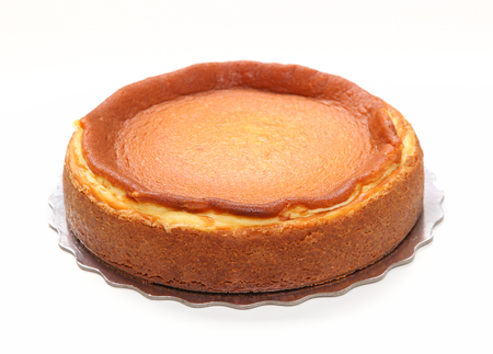 Traditional baked cheesecake dessert on silver plateの写真素材