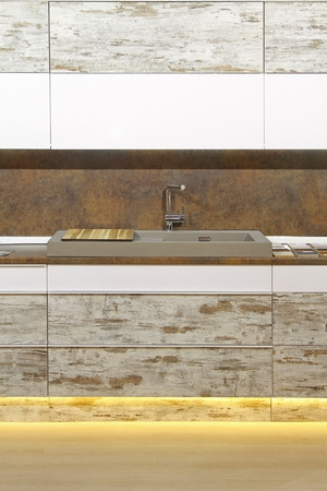Modern kitchen interior detail with marble wallsの写真素材