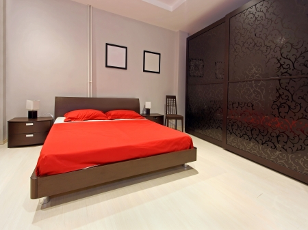 Modern bedroom interior with large double bedの写真素材