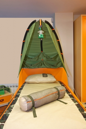 Tent bed with boyscout theme in modern bedroomの写真素材