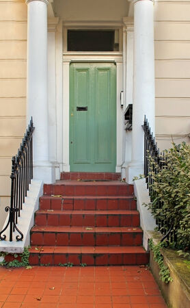 Staircase of entrance front door on retro residential houseの写真素材