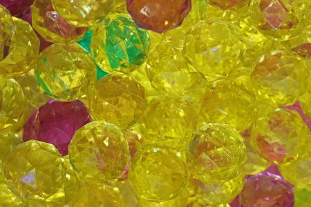 Soft colorful yellow rubber balls pile backgroundの写真素材