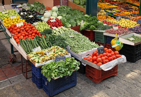 Modern grocery store with plastic crates full of fresh foodの写真素材